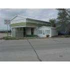 Roscoe: Old ice house. Once a donut shop, now a place to get your taxes done.
