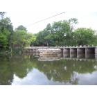 Round Rock: Brushy Creek and the Round Rock with Chisholm Trail Road in the Background