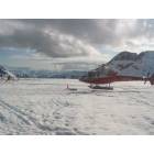 Skagway: helicopter landing  at dog camp on denver glacier , skagway