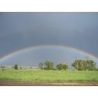Panguitch: A rainbow over a field of green
