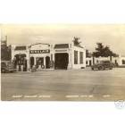 Monroe City: Photo of Sinclair Service Station w/tourist cabins and adjoining cafe; circa 1930's