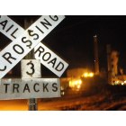 Bucksport: RR crossing sign with Paper factory in the background
