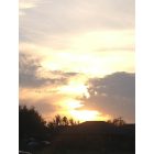 Alton: The sun peeking into the Alton skies early morning