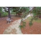 Monroe: : Walk path and bench - Black Bayou Lake Park