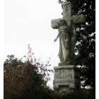 Columbus: An angel perched on a headstone in Friendship Cemetery, Christmas 2005.