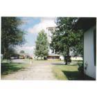 Arcola: Picture of Arcola community buildling, the Library, city clerk vehicle and the Library