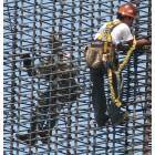 Oceanside: Ironworkers in downtown Oceanside working on the new resort complex.