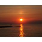 Olcott: Freighter Heading towards Toronto Skyline at Sunset From Olcott Beach