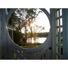 Wilmington: View of Cape Fear River Though Gate of Hostoric Downtpwn Wilmington Home