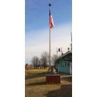 Fort Covington: Fort Covington Fire Station's flag and original Bell that was wrung when we would have a call in the early 1900's