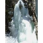 Sorrento: giant icicle formed by a roadside pipe spraying upwards