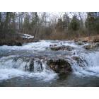 Cherokee Village: Cherokee village surrounding nature waterfall