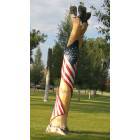 Gunnison: Patriotic carved tree in Veterans Legion Park in Gunnison
