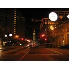 San Francisco: : Market & Main at night, the SF Ferry Building looms bright