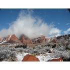 Ivins:  Snow On Red Mountain