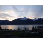 Haines: Land of the Midnight Sun. Late at night in mid summer looking across Lynn Canal towards the coast mountains from Fort Seward.