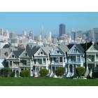 Victorian houses and the San Francisco skyline from Alamo Square