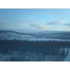 Hughes: Taking off from Hughes, the bluffs along the Koyukuk