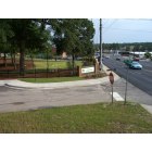 Forest Acres: The corner of Valley Road and Beltline Boulevard. The Welcome to Forest Acres sign is over 500 meters inside the actual boundaries of Forest Acres, installed on the fence of this city-owned park property for expedience's sake.