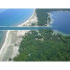 Onekama: 9 Acres for sale on the S side of the channel with LK MI and Portage Lake frontage!!!