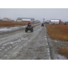 Hooper Bay: Riding back from the airstrip on a wet fall afternoon.