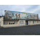 Toppenish: A mural celebrating the lost ancient Indian fishing grounds on the Columbia River at Celilo Falls is mounted above the Water Resources Building