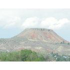 Thermopolis: : Round Top Mountain, as you drive north through the red cut south of Thermoplis, you can actually watch this mountain grow as you reach the top of the cut. Round Top proudly stands tall overlooking Thermopolis.