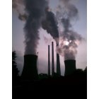 Shinnston: Photo of the power plant silhouetted against the afternoon sky.