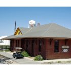 Giddings: Railroad Depot with Water Tower Behind