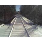 Mount Pleasant: Snow covered railroad tracks that intersect the walkway connecting the city parks. (January 2006)
