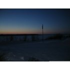 Nulato: Nulato School Flagpole and the Yukon, just before a midmorning sunrise