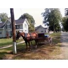 Montgomery: An Amish Buggy parked by the Hunting store.