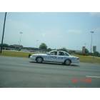 Longview: Police car on loop in front of mall