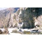 Pecos: rock near frozen river up the canyon