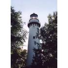 Evanston: 1879 lighthouse catches setting sun on Lake Michigan shoreline
