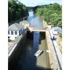 Lockport: Erie Canal looking NE from Pine Street - small sport boat passing through lock