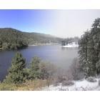 Crestline: : Two pictures of Lake Gregory taken from the same spot, one in July and one in January and merged together.