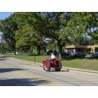 Edwardsville: : Tractor going down the road in front of the elementary school