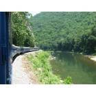 Romney: : The Potomac Eagle rounds the curve while families enjoy the trough Romney West Virginia July 2006