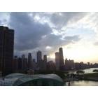 Chicago: : Sunset and a moving weatherfront over the skyline from the Navy Pier ferris wheel.
