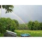 Rainbow in back yard over river at the high end of Water Street