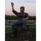 Moon over Paul Bunyan\'s shoulder, at the visitor center Hwy 371