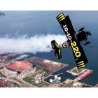 Cleveland: : An acrobatic plane over Cleveland stadium.