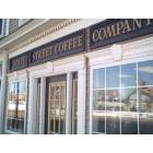 Cheboygan: : State Street Coffee Company with view of Ottawa Art Park in reflection