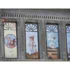 Arkansas City: East side of Summit Ave, murals painted on the main street buildings