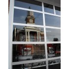 Culpeper: Reflection of the courthouse in the fire station door