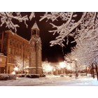 Corning: : The clock tower on Market Street on a silent snowy night.