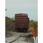 Moline: : railroad car by 34th street and river by salvage yard in Moline
