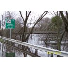 Taunton: 2010 Flood, view of Taunton River cresting under railroad on Route 44 on the Taunton, MA /Raynham MA town line....