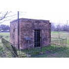 Kemp: Built in the early 1900's the calaboose was used to jail offenders of the law. It is legended that Bonnie Perker (of Bonnie and Clyde fame) and one other member of the Barrow Gang were held here in 1932.
